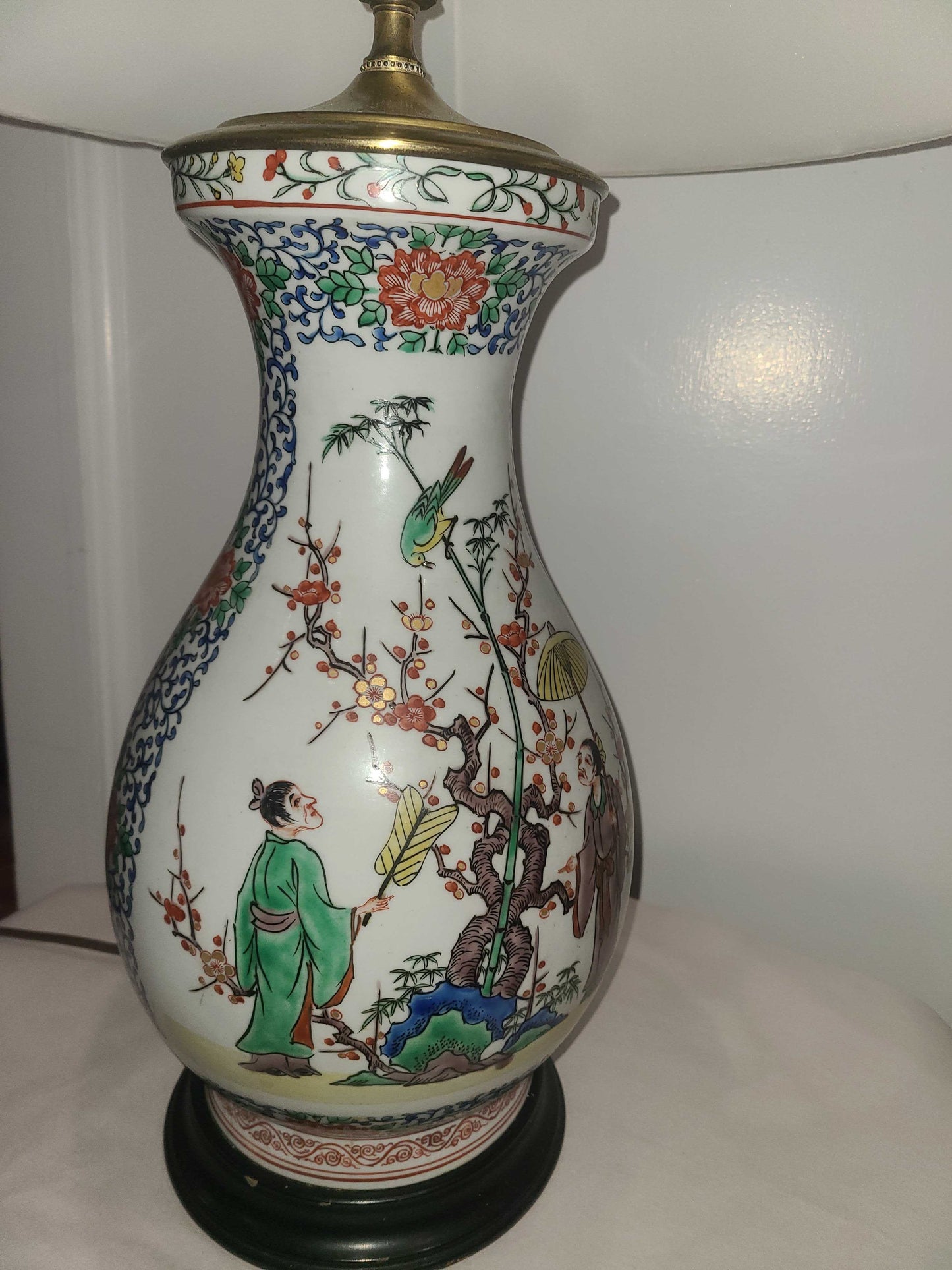 Modern handpainted Chinese style lamp, with brass top.