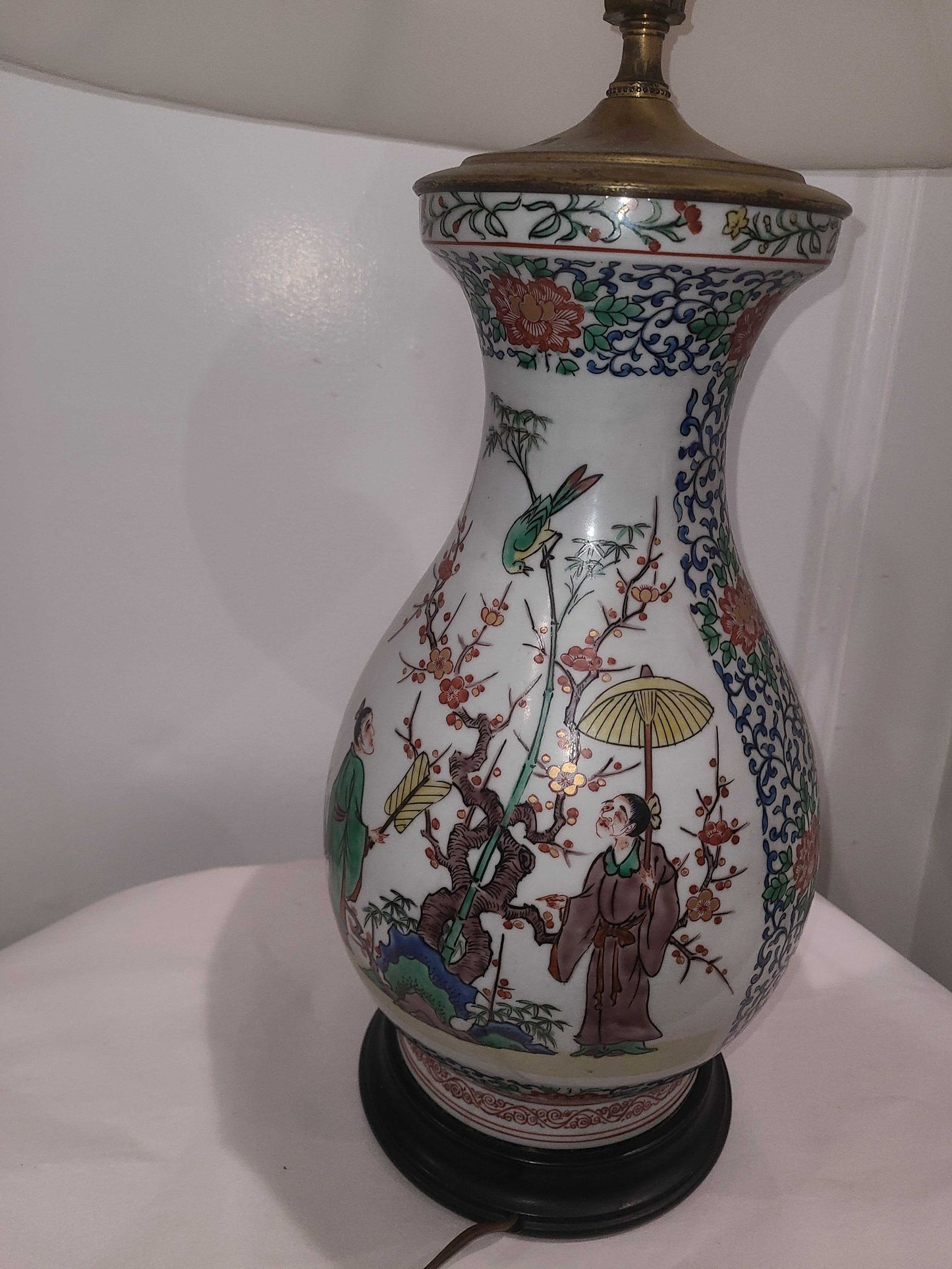 Modern handpainted Chinese style lamp, with brass top.