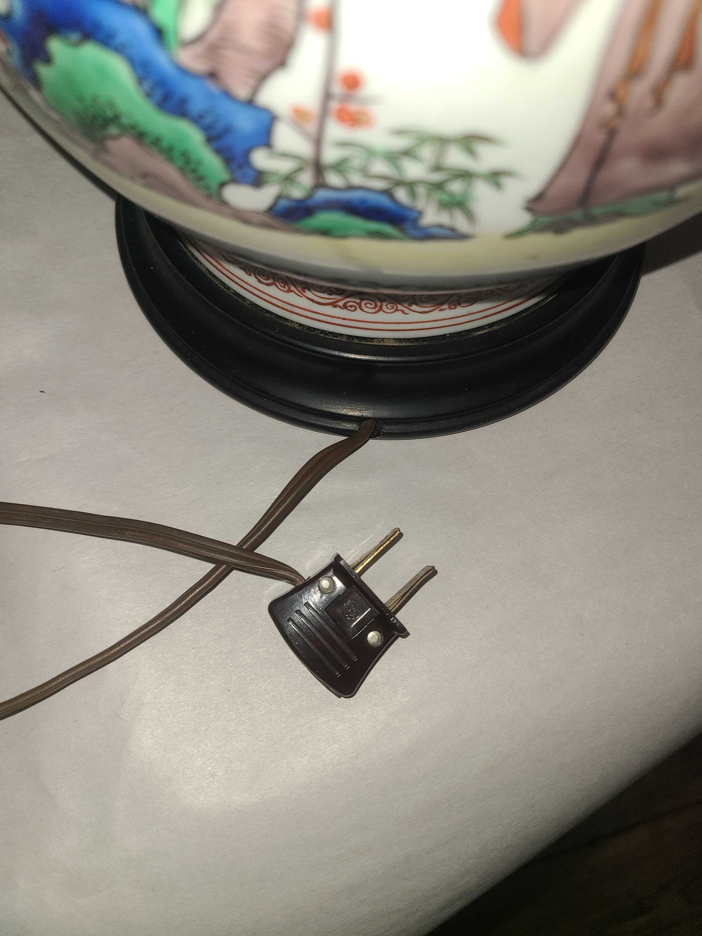 Modern handpainted Chinese style lamp, with brass top.