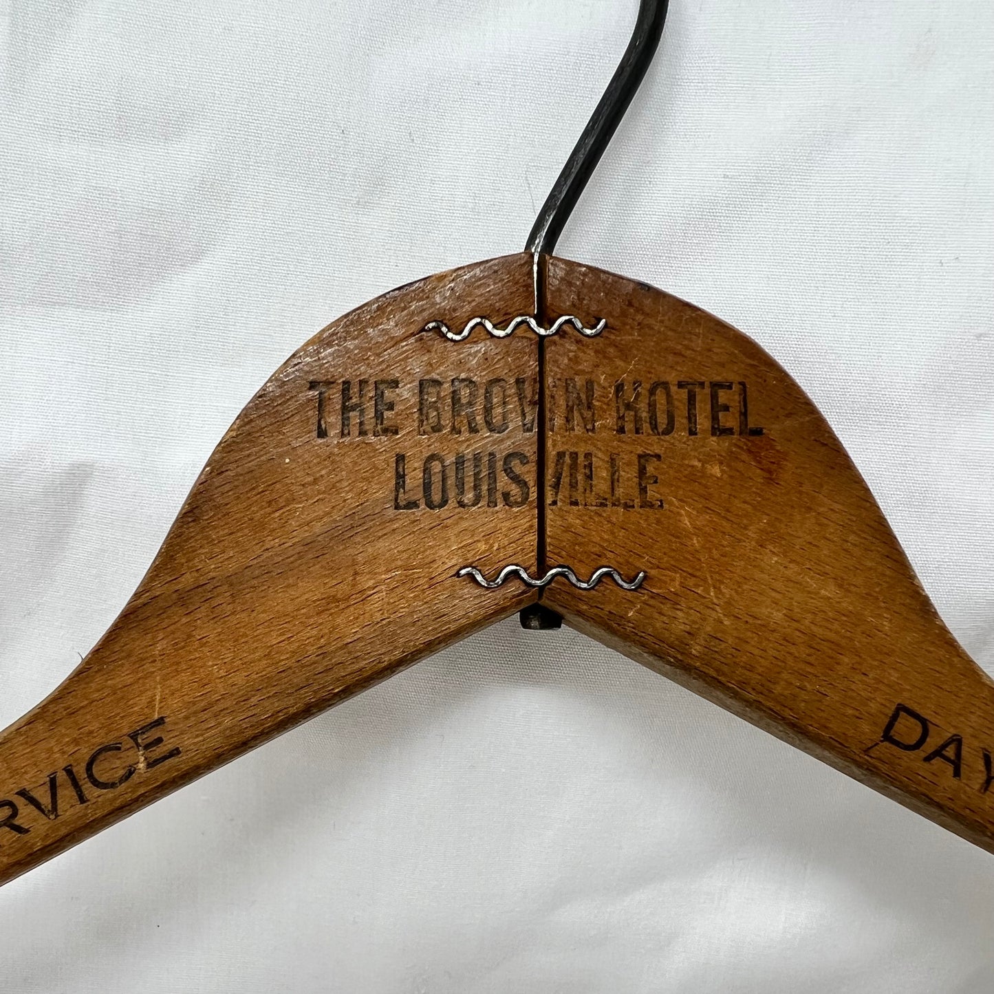 Vintage MCM “The Brown Hotel” wooden hanger
