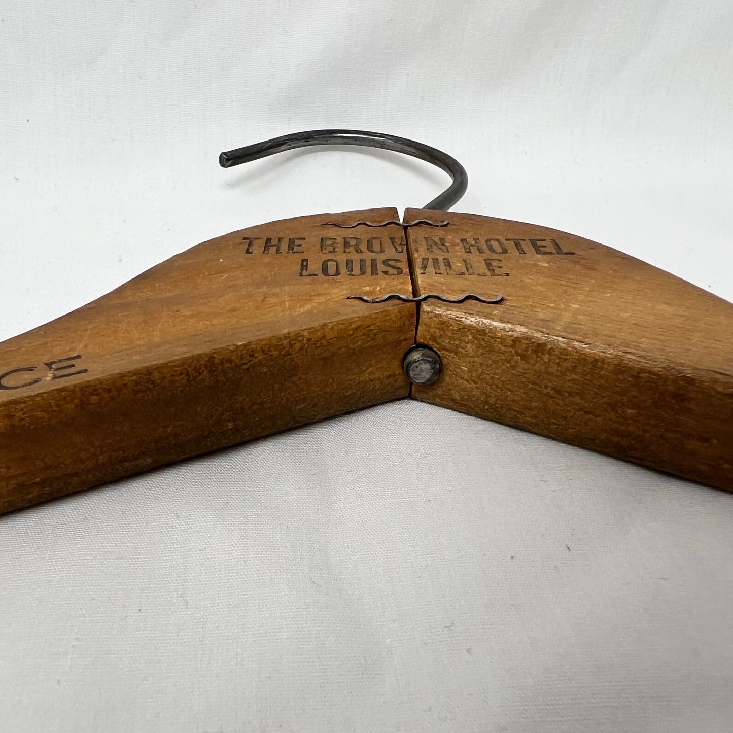 Vintage MCM “The Brown Hotel” wooden hanger