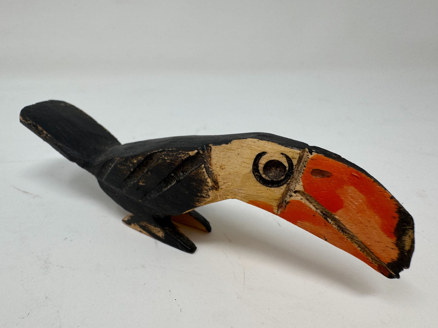 Tiny carved Toucan