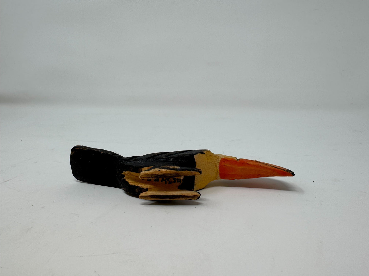 Tiny carved Toucan
