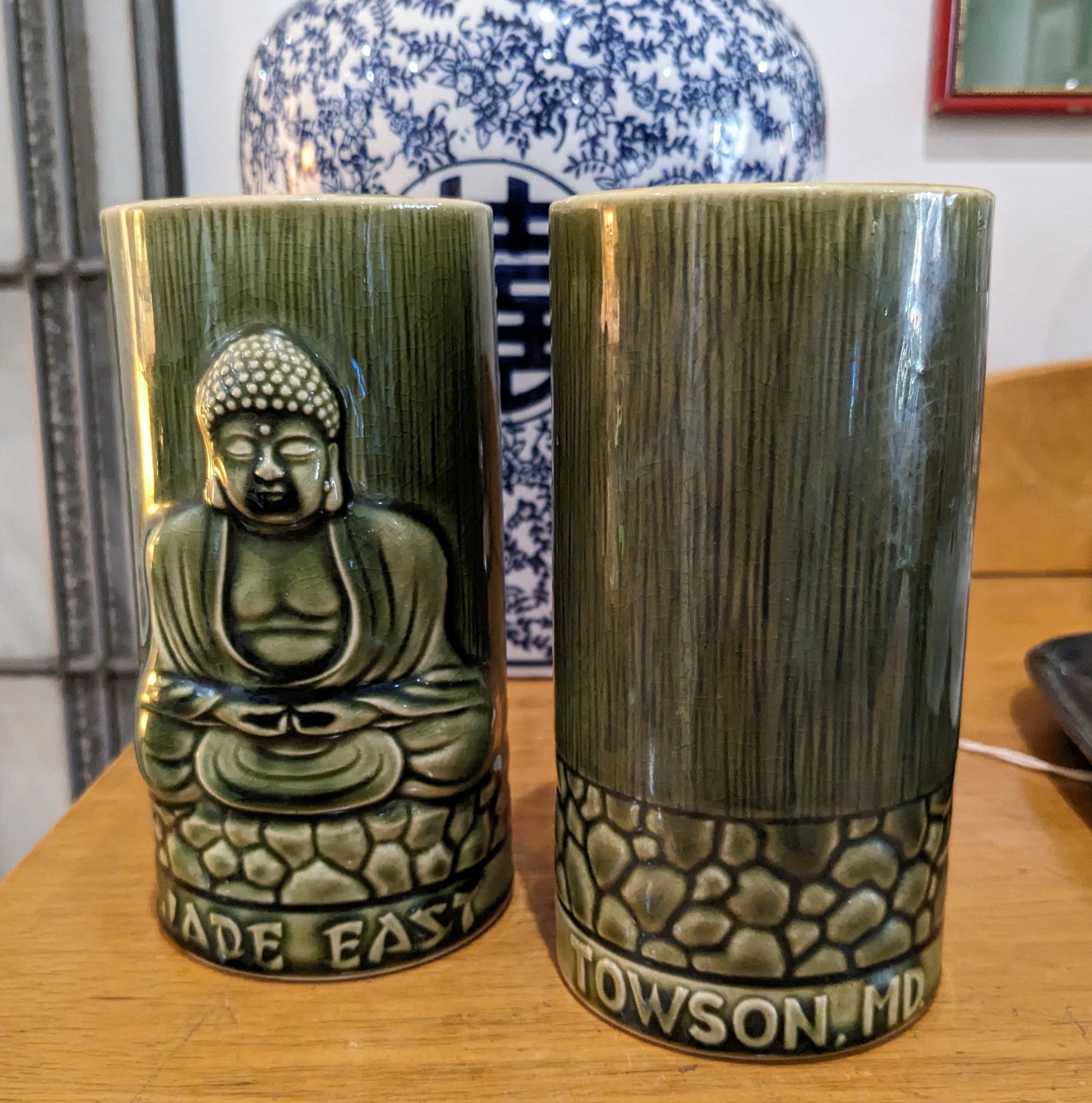 Pair of vintage Buddha green ceramic tiki mug