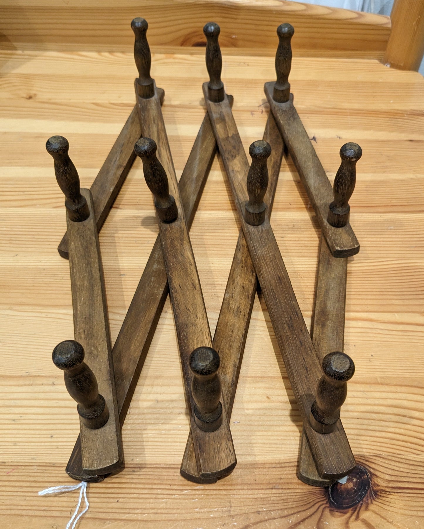 accordion wooden peg board