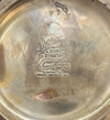 Closeup of vase bottom, reads "Ivory Dynasty / Copyright Arnart Imports, Inc"