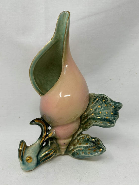 bud vase shaped like conch shell with fish adornments