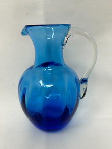 Blue glass pitcher with clear handle, 4.75-inch height