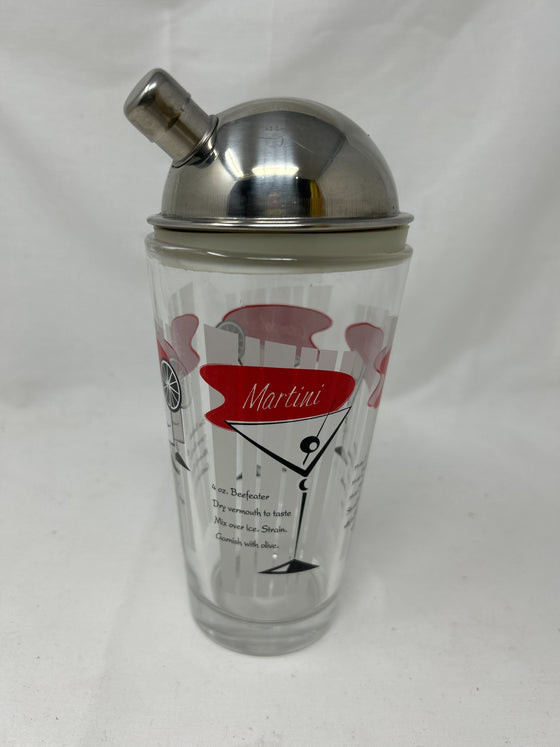 Glass cocktail shaker with metal lid; clear transparent glass with printed cocktail recipes