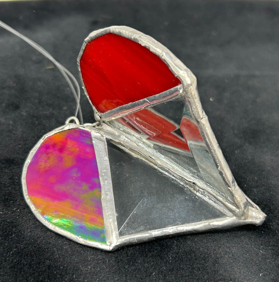 3D heart made with red and pink hues of stained glass