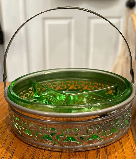 Vintage three-compartment candy dish, green glass sits within a silver and gold basket with hinged handle