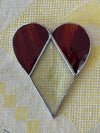Elongated heart: Stained glass heart with two red sections and one transparent, diamond-shaped, beveled section