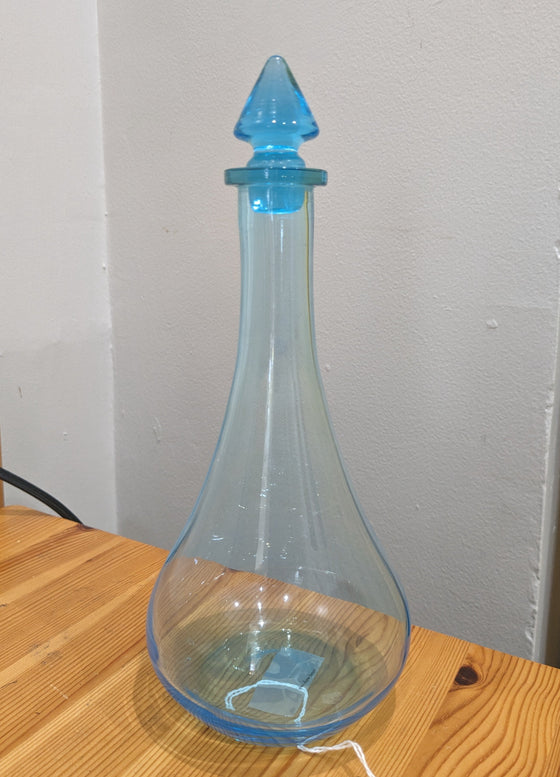 Replica of an apothecary show globe bottle, aqua glass with glass stopper