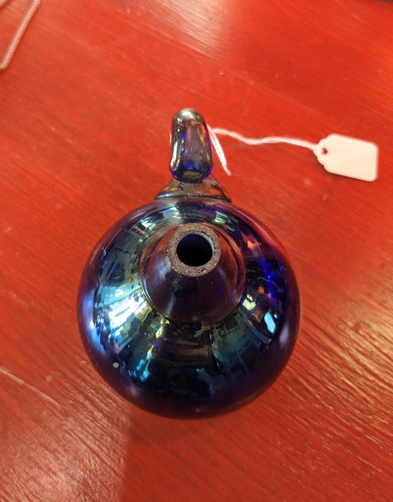 Small iridescent blue blown glass oil lamp