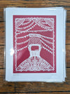 White papercut print on red background depicting a snowball stand