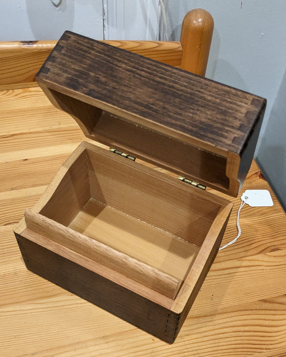 Dark wood box, brass hinges, tongue and groove joinery
