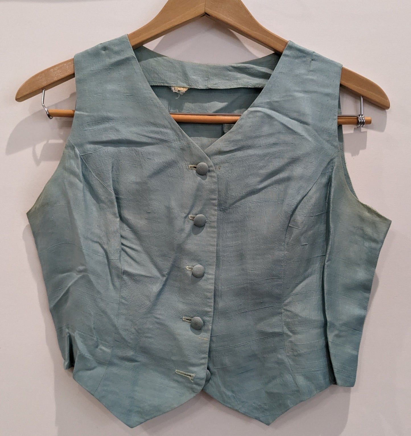 Pale turquoise vest/sleeveless shirt, cropped, 5 buttons