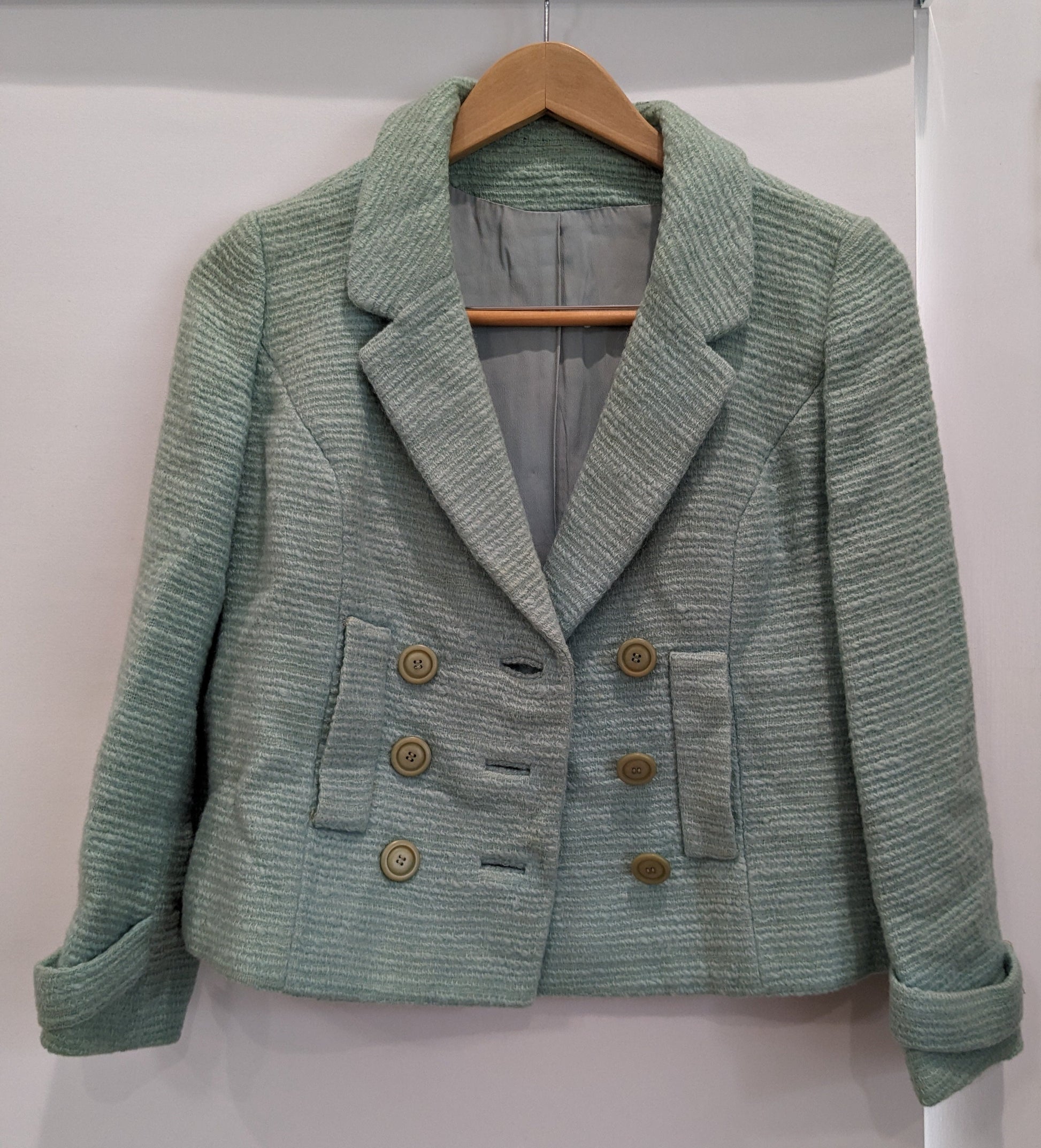 Tweed turquoise blazer, double-breasted with pockets, shown unbuttoned