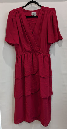  Red tiered dress with voluminous sleeves, cross-over V-neck