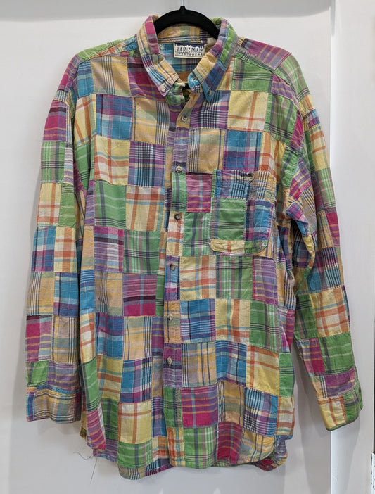 Multicolor patchwork of different plaids on long-sleeved button-down