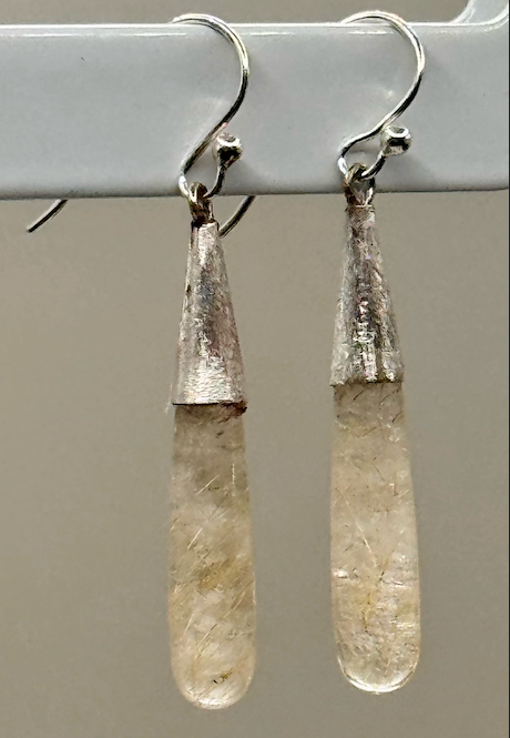 Sarah Wolfenden: Earrings of Rutilated (Golden) Quartz with brushed sterling cones