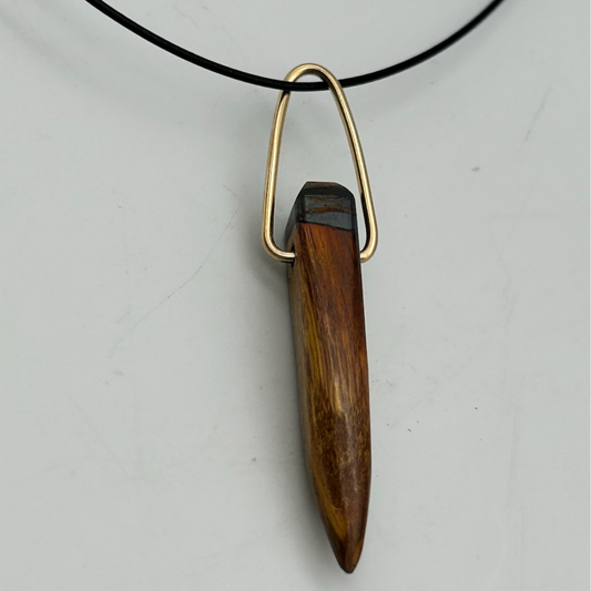Sarah Wolfenden: Tiger iron matchstick pendant